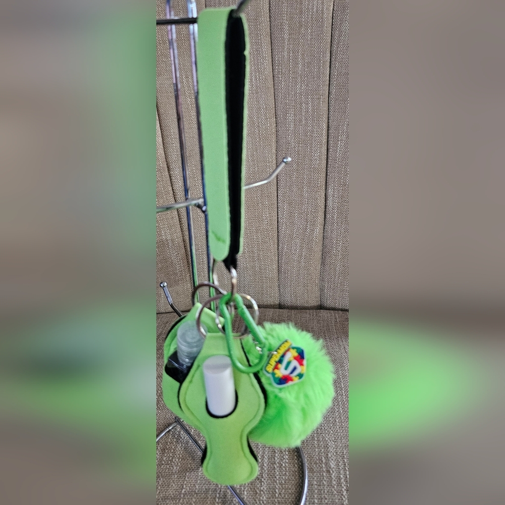 Green Autism Keychain with Pom Pom Peach Lip Care And Sanitizer Included New